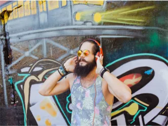 Young man listening to headphones